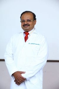 Dr Abraham Oomman